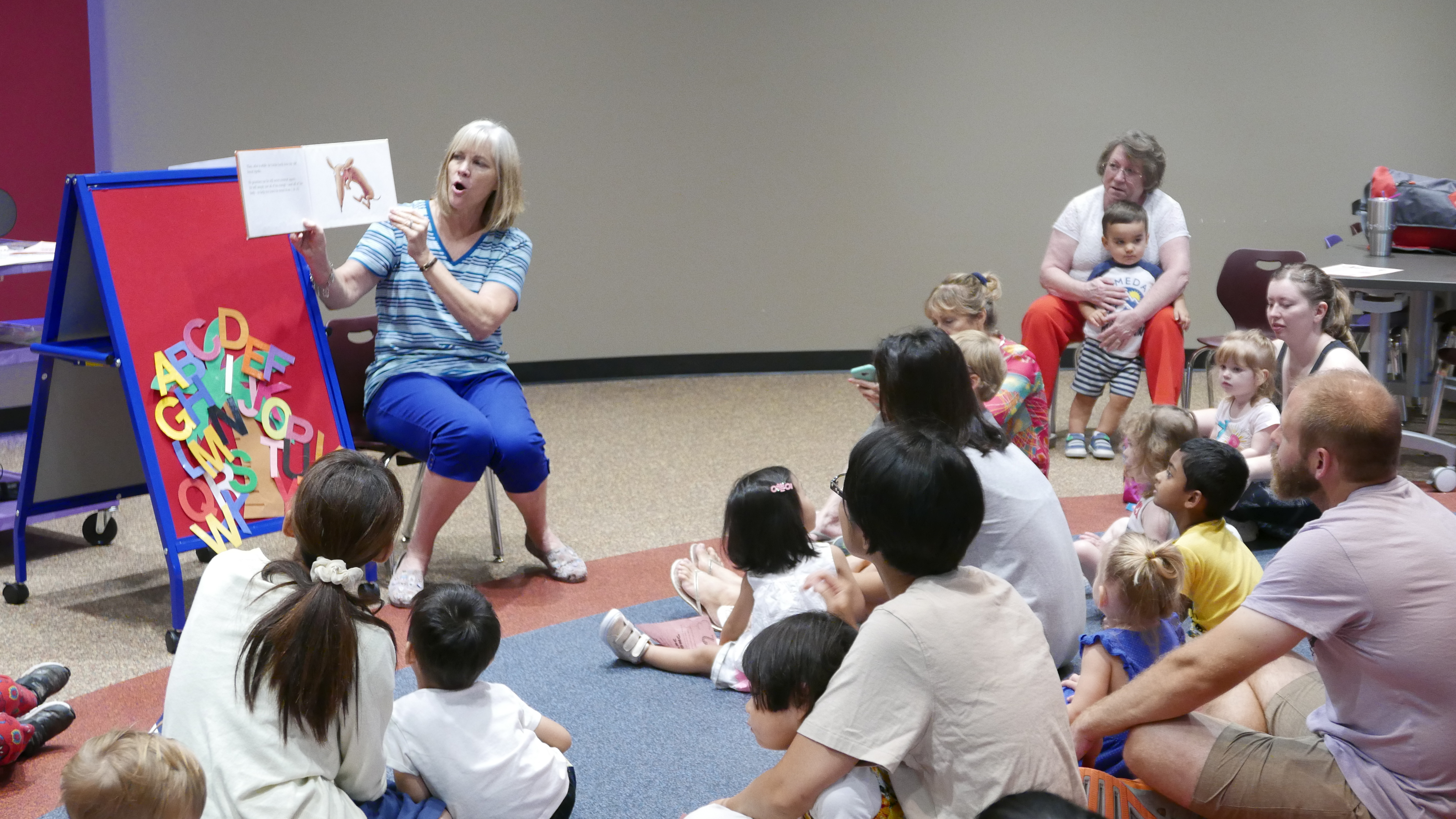 Woman reading to children during a storytime
