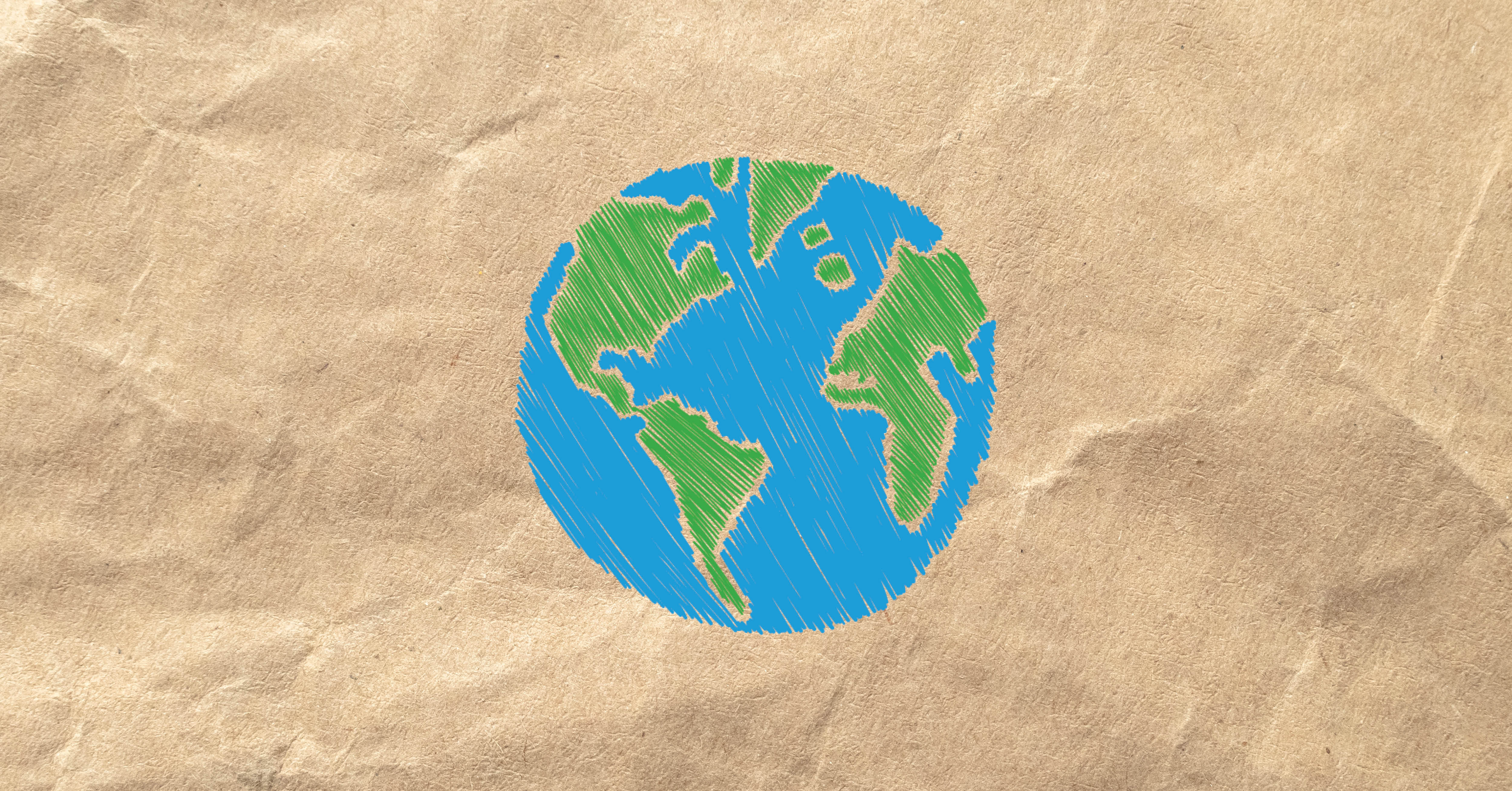 Brown paper with a hand drawn earth in the center.