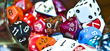 Close up of colorful multi-sided dice for dungeons and dragons game play.