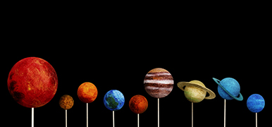 Solar System model on a black background.
