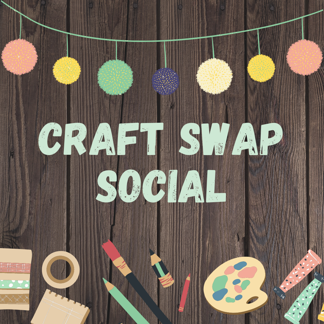 An image with a wood background, hanging poms poms at the top, and craft supplies at the bottom.  The text 'Craft Swap Social' is in the center.