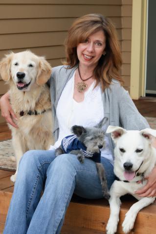 Photo of the author Susannah Charleson with her three dogs.