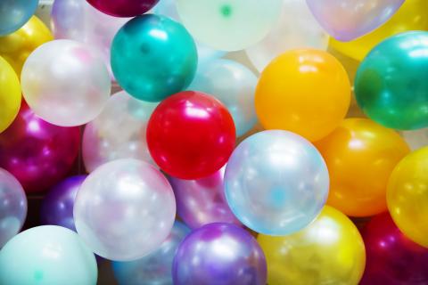 Large group of colorful balloons.