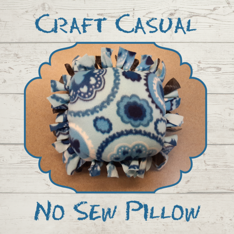 A picture of a new sew pillow in shades of blue.  The text "Craft Casual" is above the picture and the text "No Sew Pillow" is below the picture.