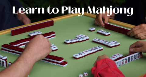 A picture of people playing mahjong at a table with the text "Learn to Play Mahjong" across the top.