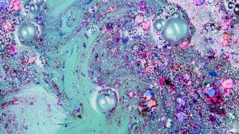 blue and purple liquid with glitter.