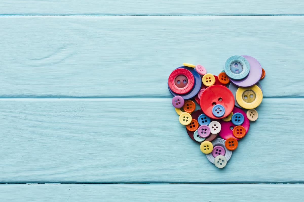 Buttons in the shape of a heart on a blue background.