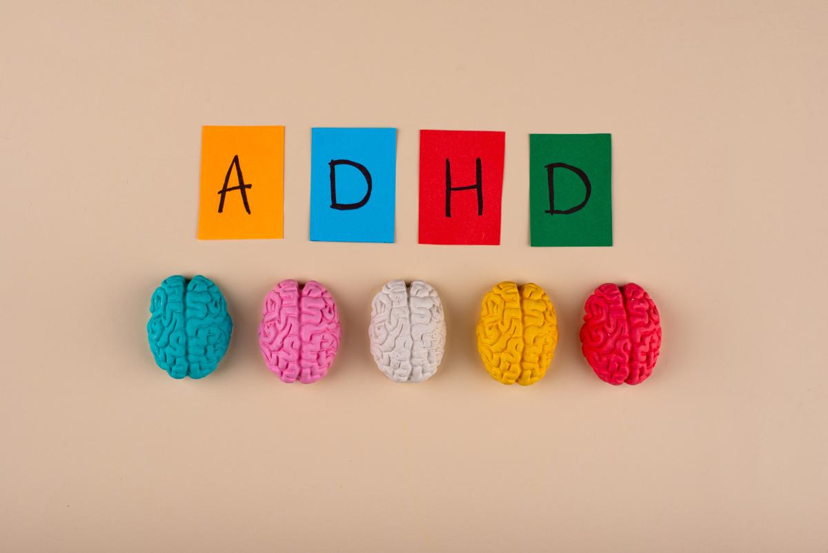 ADHD with human brains next to it